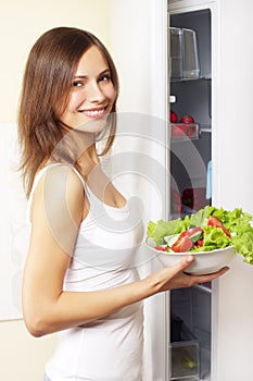 Girl with healthy salad
