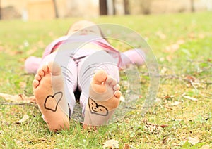 Girl with hearts on soles