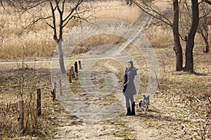 Girl and her dog in park