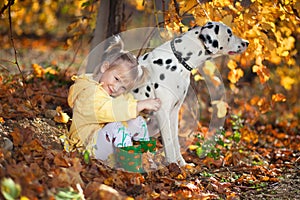 A girl and her dog in vineyard