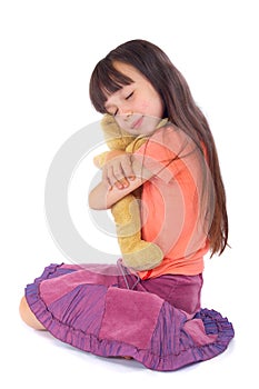 Girl with her favourite toy be photo