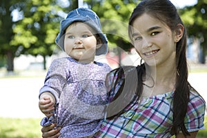 Girl with her little sister