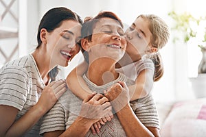 Girl, her mother and grandmother