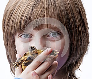 Girl with her pet - tortoise