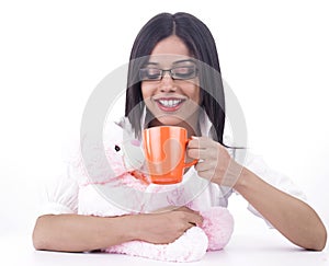 Girl with her pink teddy bear