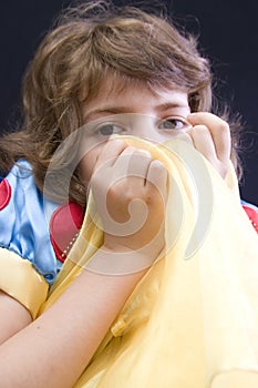 Girl Hiding Behind Fabric photo