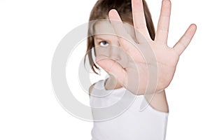 Girl Hiding Behind her Hand