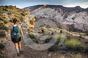 Girl Hiker in a Brimhall Natural Bridge Trail Capitol Reef Nati