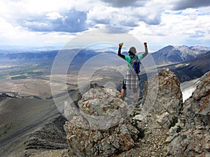 Girl hiker summit mountain top