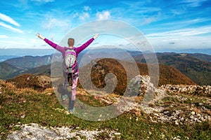 Girl hiker on top of the hill Klak in Slovakia