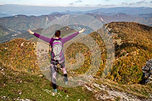 Girl hiker on top of the hill Klak in Slovakia