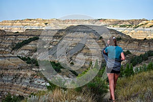 Girl Hiking along the Badlands