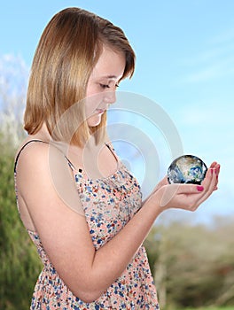 Girl hold planet Earth globe
