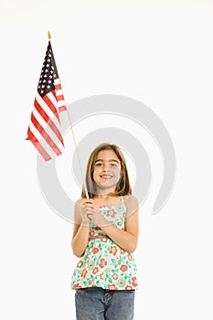 Girl holding American flag.