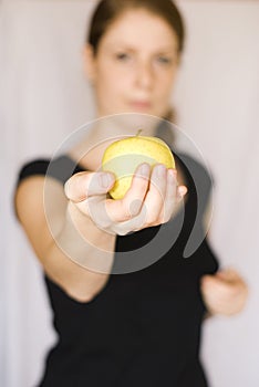 Girl holding an apple