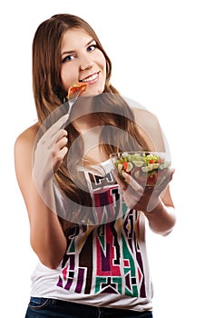 Girl holding a bawl with salad