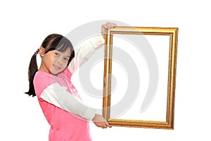 Girl holding blank picture frame