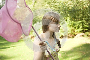 Girl Holding Butterfly Net