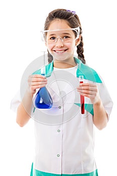 Girl holding chemical flask