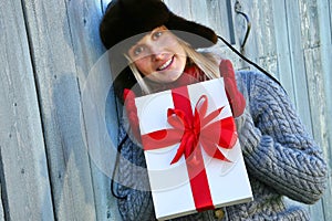 Girl holding Christmas gift