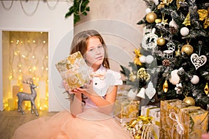 Girl holding Christmas present