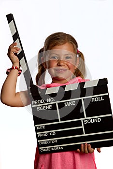 Girl holding a clapperboard photo