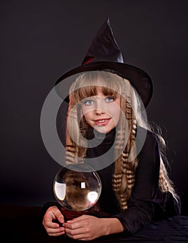 Girl holding crystal ball.