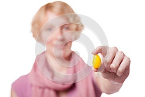 Girl Holding Easter Egg in front of the Cameras