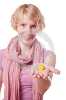 Girl Holding Easter Egg in front of the Cameras