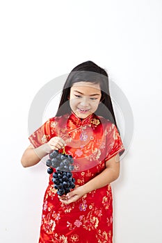 girl with holding a Eating Grape bunch