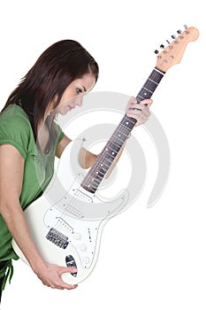 Girl holding electric guitar