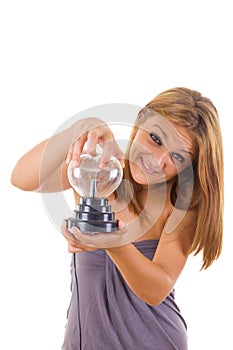 Girl holding electric vitreous heart of glass photo