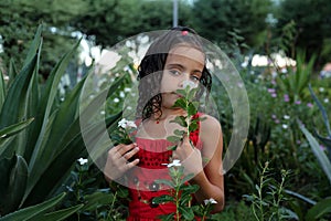 Girl holding a flower