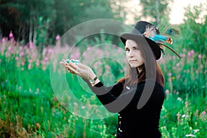 a girl holding a glass ball