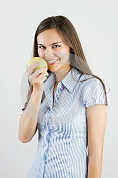 Girl holding a green apple