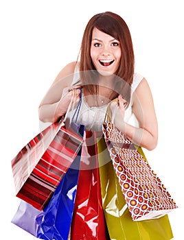 Girl holding group shopping bag.