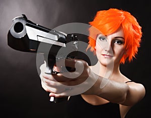 Girl holding gun