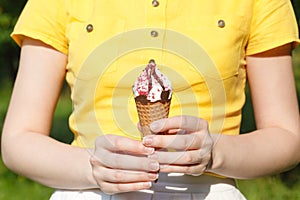 Girl Holding Ice Cream In Cup