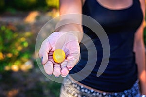 Girl holding a lemon