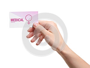 Girl holding medical business card isolated on white. Women`s health service