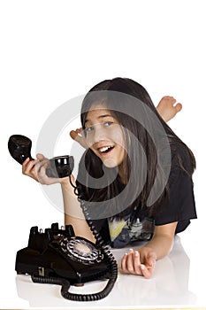 Girl holding old rotary phone