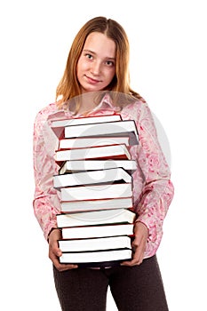 Girl holding a pile of color books.