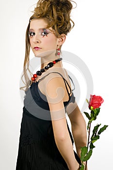 Girl holding a red rose photo