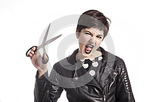 Girl holding scissors on white