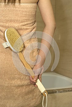 Girl Holding a Scrub