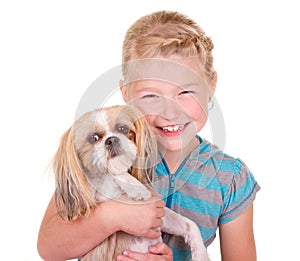 Girl holding a shih tzu dog