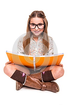 Girl holding a sketchbook