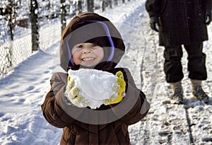 Girl holding a snowball