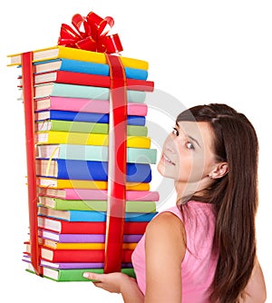 Girl holding stack of book.