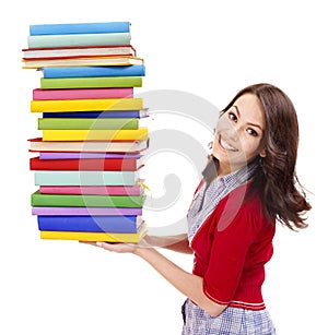 Girl holding stack color book .